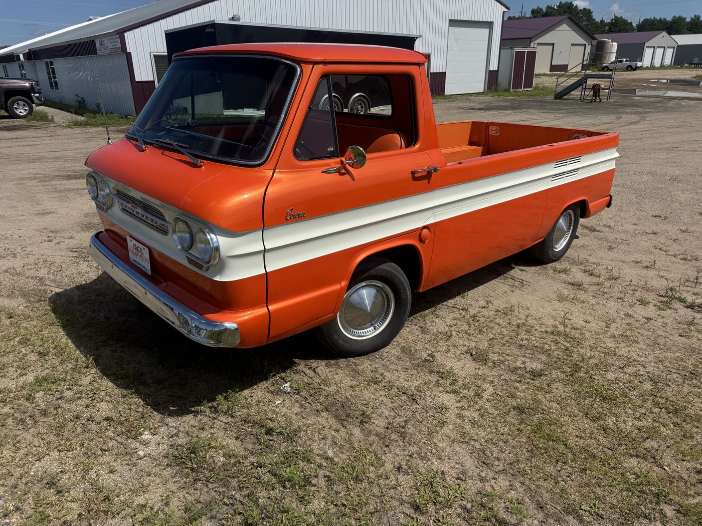 Orange and white pickup, front