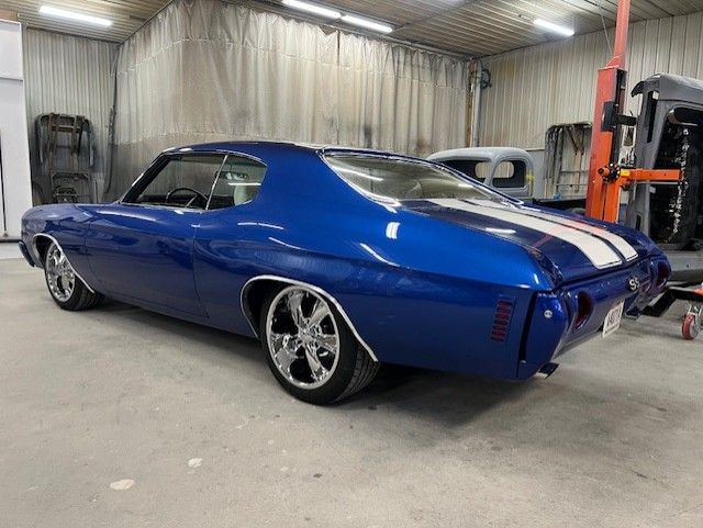 Blue SS coupe in the shop