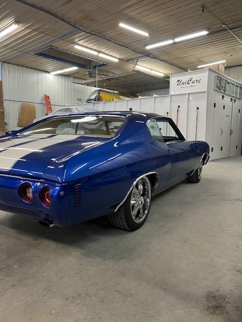 Blue SS coupe, rear three-quarter