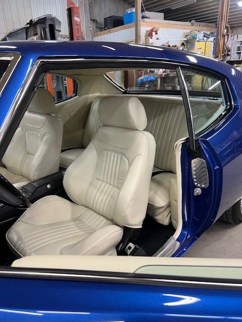 Blue SS coupe, cream interior