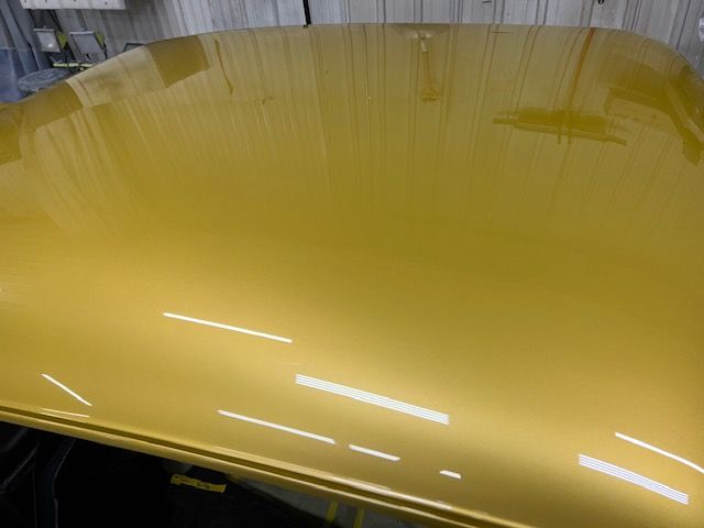 Gold paint, panel reflection